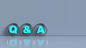 What Do Mold Spores Look Like - A Blue-Gray Background with a Q and An A in Metal Ring.