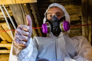 Attic Mold Remediation Services for New York Properties - A Mold Remediation Tech Giving a Thumbs Up