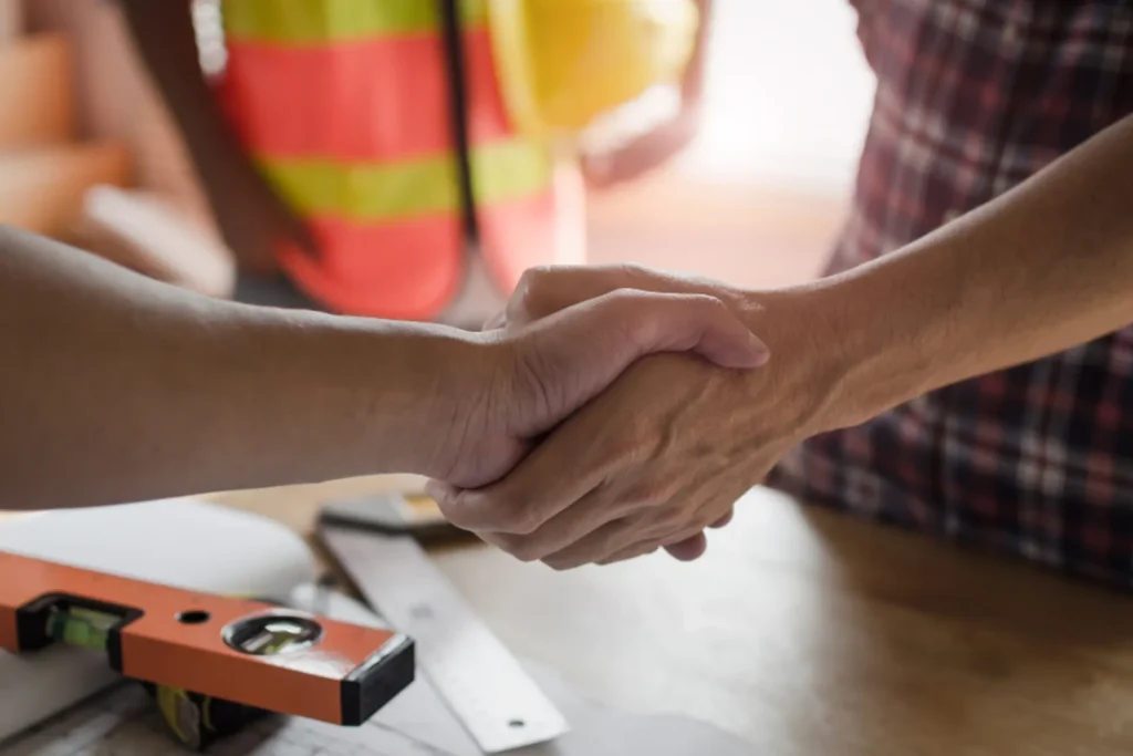 Benefits of Regular Mold Inspections - A Contractor Shaking Hands with a Homeowner