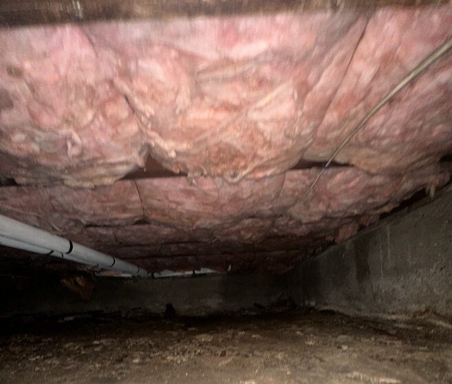 Benefits of Crawl Space Encapsulation - A Picture of Fiberglass Crawl Space Insulation