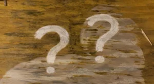 What Causes Mold in the Attic - An Attic with Mold On it and Two Question Marks