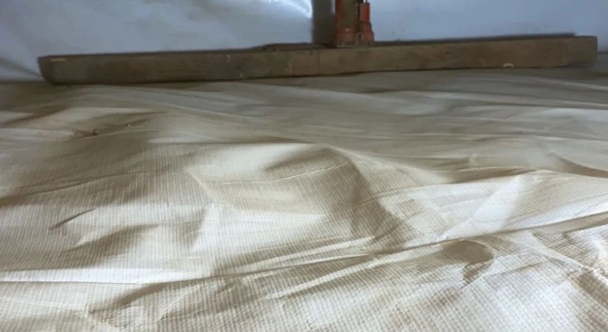 Crawl Space Mold Prevention - A Crawl Space with a Vapor Barrier Installed and Insulation
